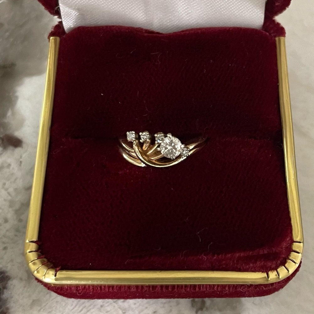 Vintage early 80’s .25 Karat & 4 Small Diamonds Set in 14K Yellow Gold Size 3.75